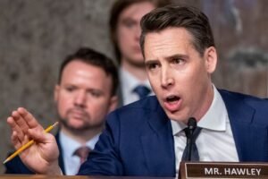 Sen. Josh Hawley (R., Mo.) questioning Mark Zuckerberg during a Senate committee hearing in Washington